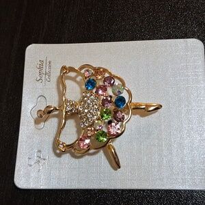 Elegant Gold Ballerina Brooch with Multicolor Stones